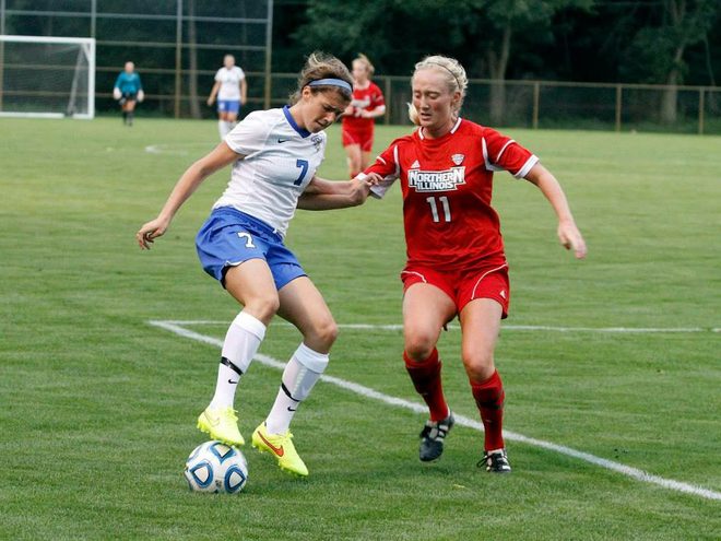 Kal Mogler holding off a defender while shielding the ball